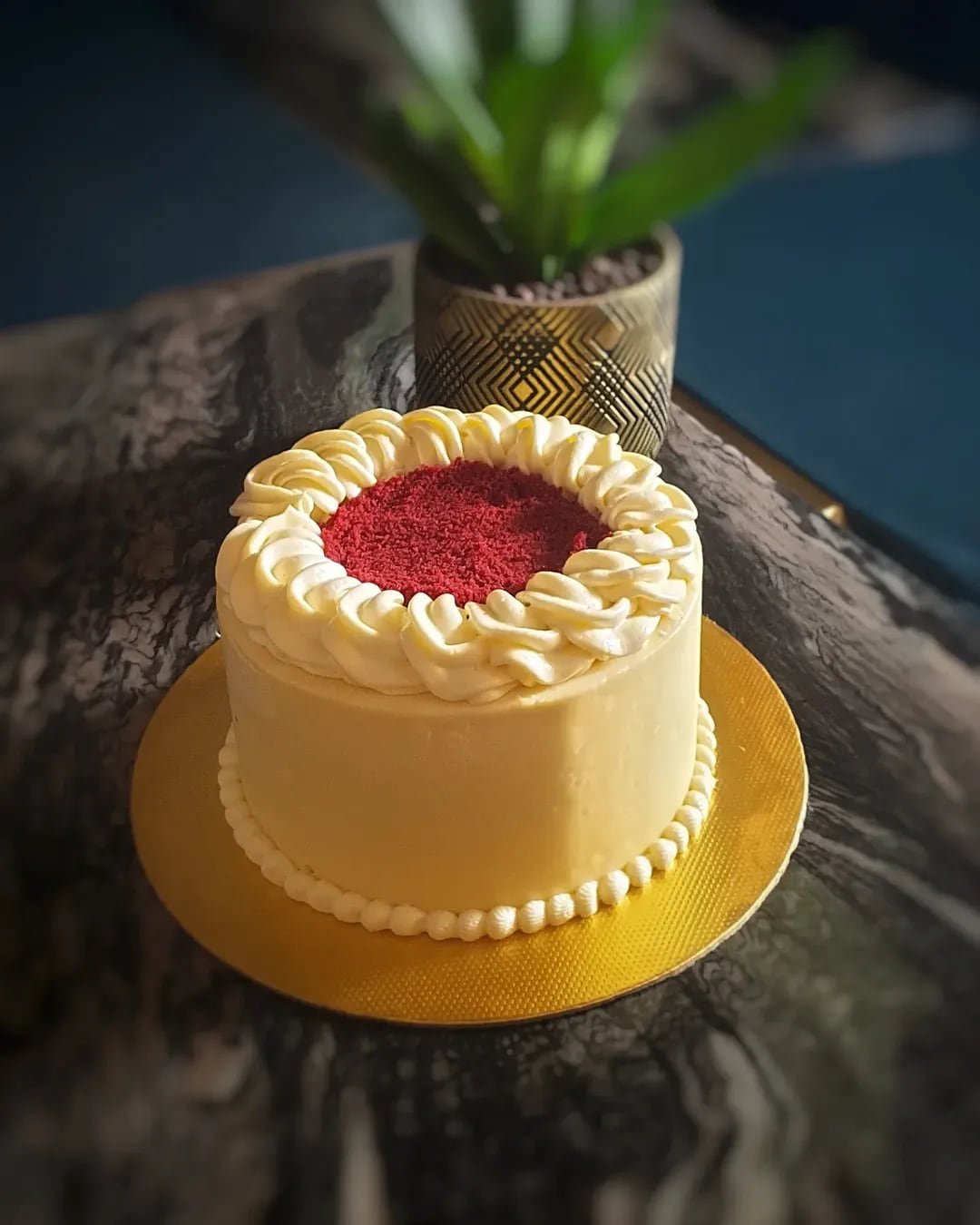 Classic red velvet cake with piped cream cheese frosting