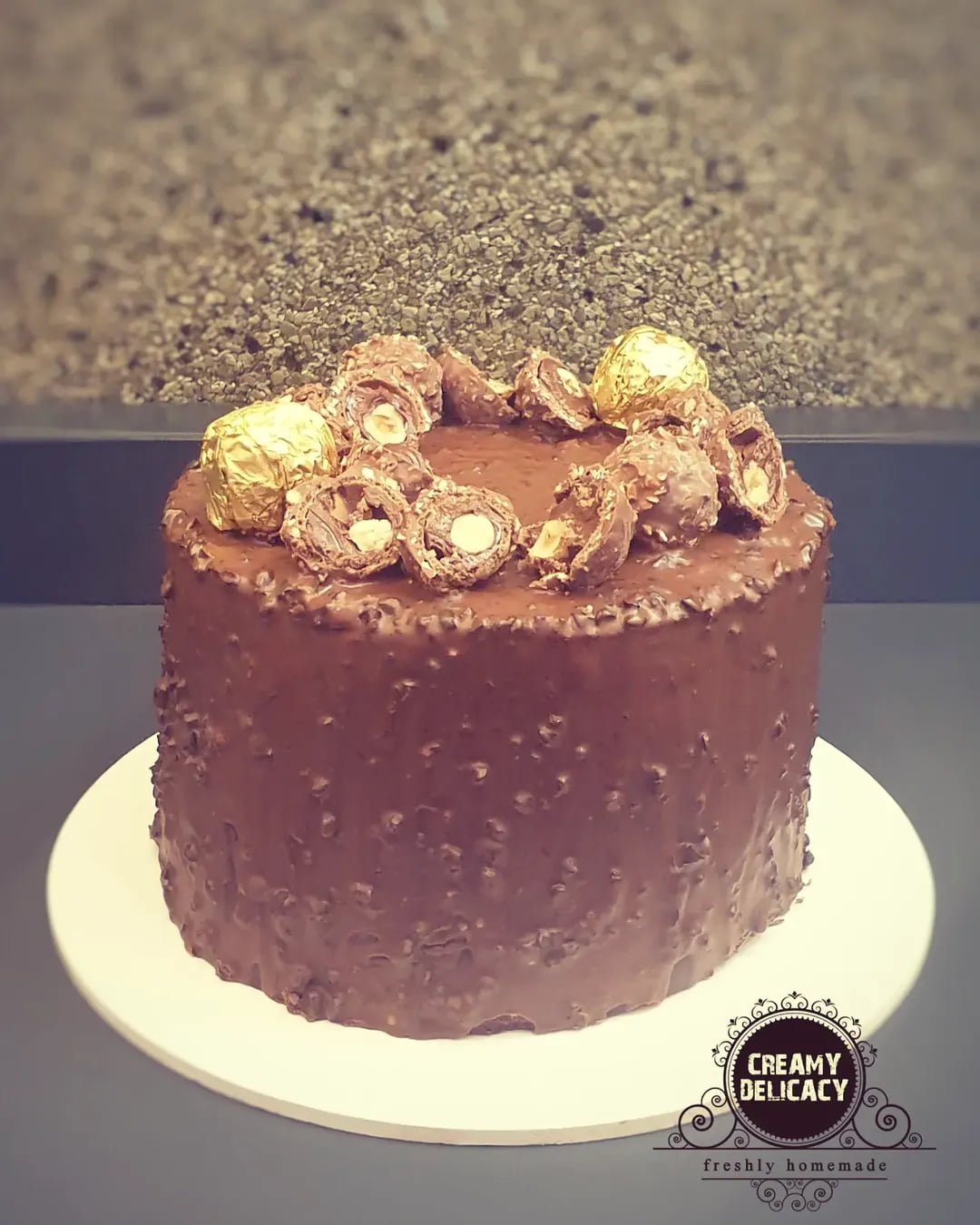 Ferrero Rocher cake with a glazed chocolate finish