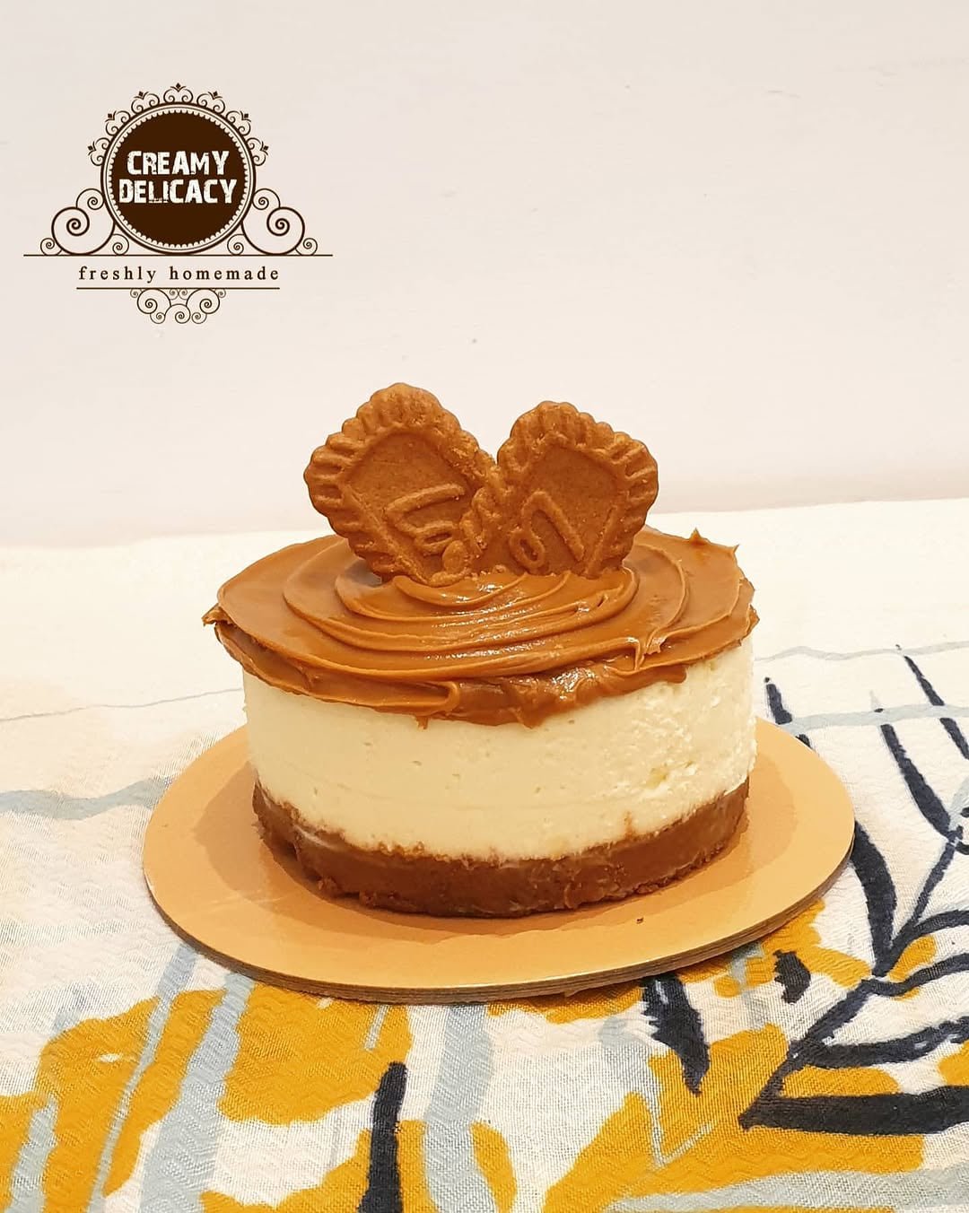 Lotus Biscoff baked eggless cheesecake topped with Biscoff biscuits